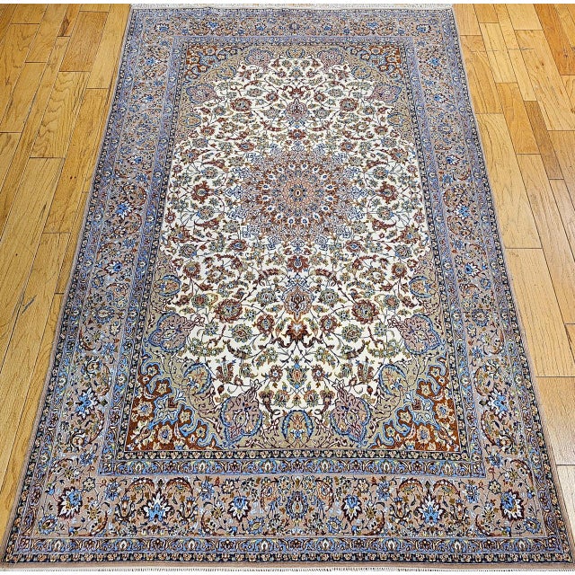 "This exquisite vintage Persian Isfahan room-size rug, dating from the late 20th century, showcases masterful...