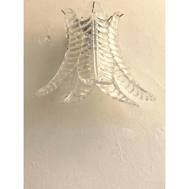 Set of two Contemporary italian trasparent “FELCI ” wall sconces . Felci are hand made from masters of Murano Glass. Made...