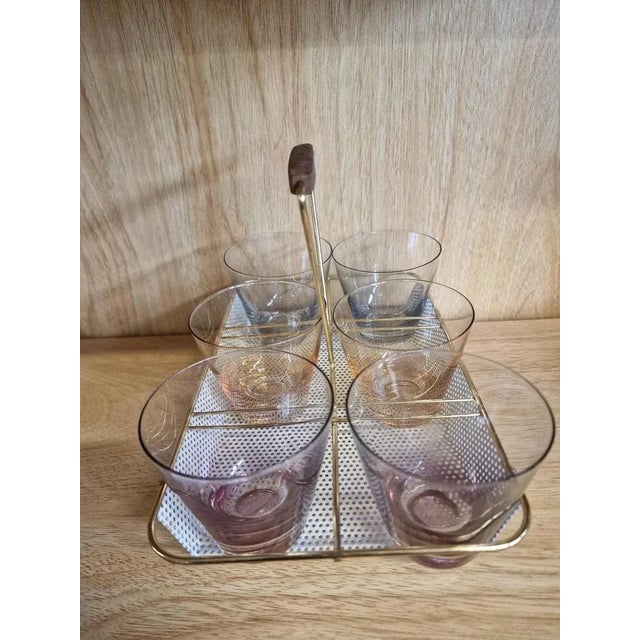 State frame, sometimes painted white. Grip made of teak wood.