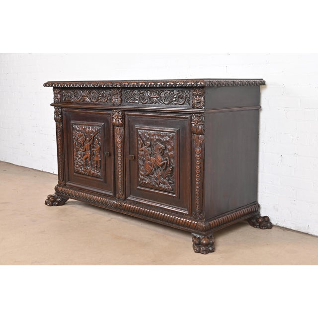 An exceptional Victorian or Renaissance Revival sideboard, credenza, or bar cabinet In the manner of R.J. Horner Romania,...