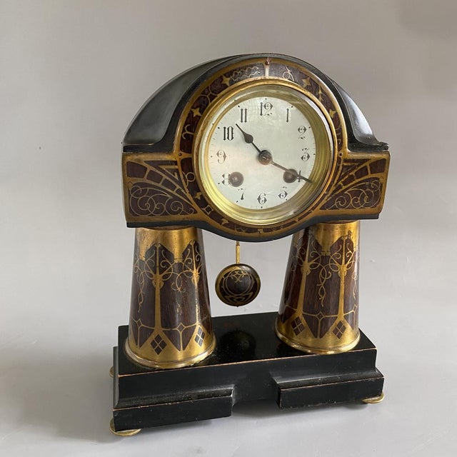 Art Nouveau Zodiac Mantle Clock by Erhard and Sons, around 1910. Decorative table clock in egyptian design with...