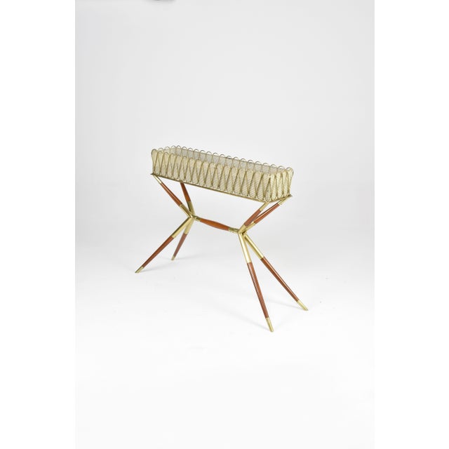 A 1950s Italian jardinière by Cesare Lacca, a celebrated designer known for his refined mid‑century furniture and...