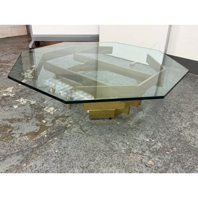 Design Plus Gallery presents a Vintage Paul Mayen Style Octagonal Glass Top Coffee Table. This vintage modernist design...