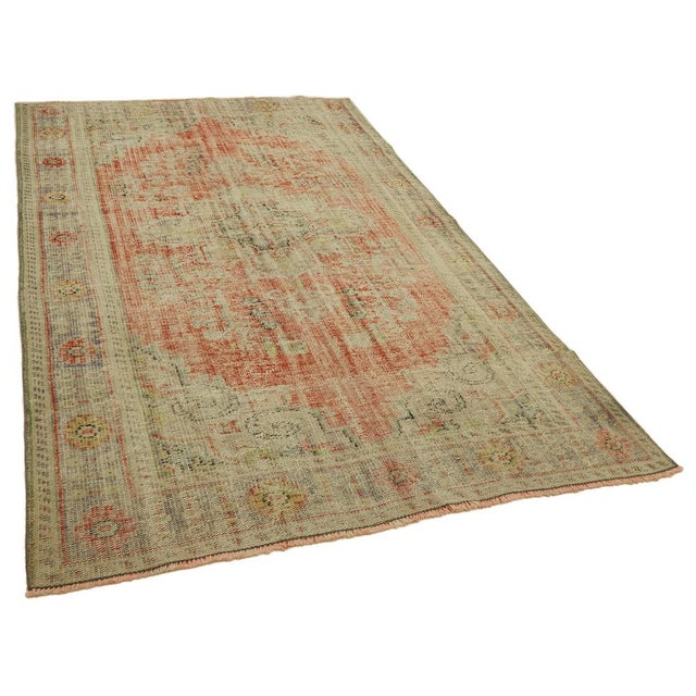 This stunning piece is part of our curated collection of vintage rugs, crafted from authentic hand-knotted Turkish rugs...