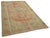 This stunning piece is part of our curated collection of vintage rugs, crafted from authentic hand-knotted Turkish rugs...