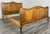 This Vintage French Louis double bed frame showcases elegant carved wood panels, curved shaping and a warm oak finish that...