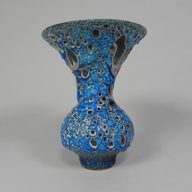 The thick layer of coarse glaze makes these vases called 'fat lava' vases. Height: 27 cm. Ø: 21 cm. Origin: France, 1950s....