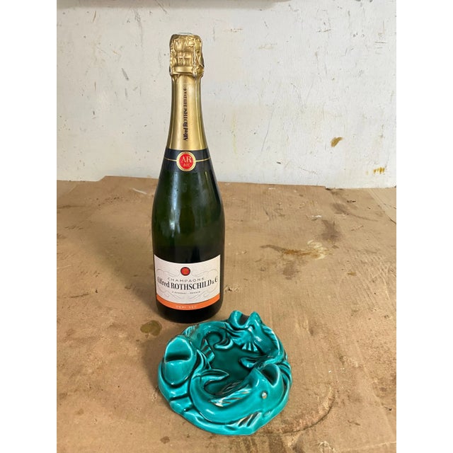 Art Deco ashtray or vide poche in ceramic. Green color. Made in France. Fishes Pattern.