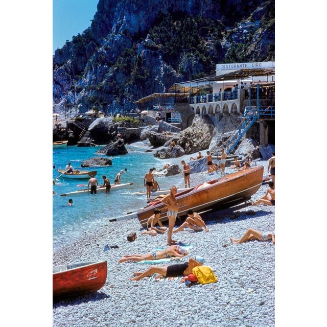 Capri Riva Boat Beach by Toni Frissell Beachgoers relax on the Capri coast, 1959. (Photo by Toni Frissell) 20x16" inches /...