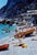 Capri Riva Boat Beach by Toni Frissell Beachgoers relax on the Capri coast, 1959. (Photo by Toni Frissell) 20x16" inches /...