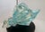This exquisite hand-blown conch shell sculpture is a masterwork of glassmaking. Featuring a luminous "Aurora Borealis"...