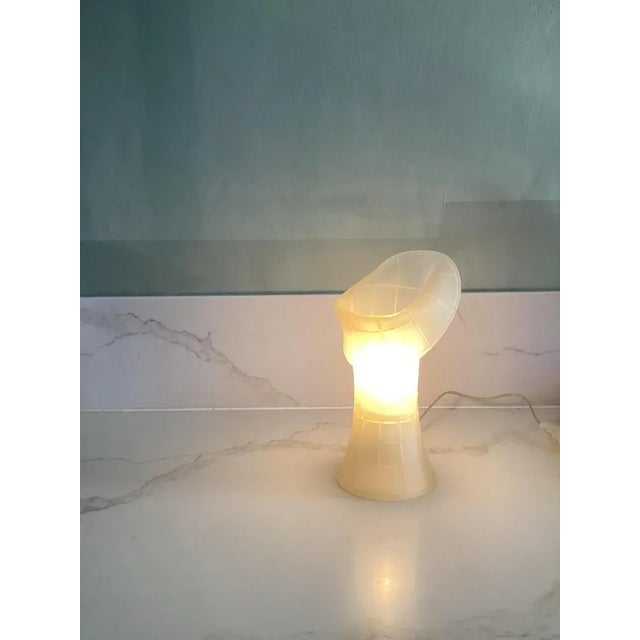 Pop Art Birzi Table Lamp by Carlo Forcolini for Luceplan, 1980s, in Very Good conditions. Designed from 2000 This piece...