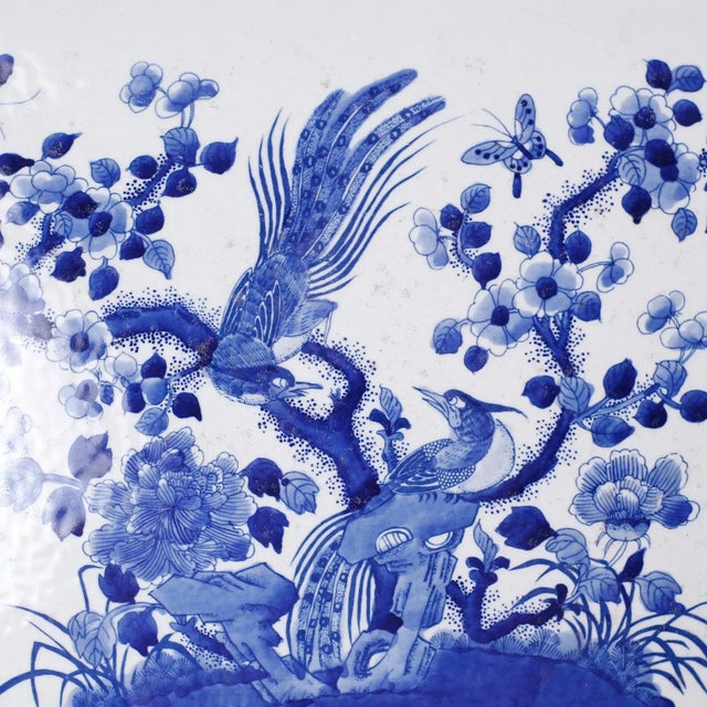 Unusual Chinese blue and white porcelain tray hand decorated with birds, butterflies, and flowers.