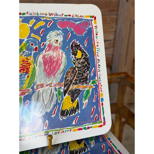 Bring a burst of color to the table with this vibrant set of six vintage placemats featuring artwork by celebrated...