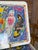 Bring a burst of color to the table with this vibrant set of six vintage placemats featuring artwork by celebrated...