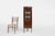 A refined French corner display cabinet from the mid-20th century, crafted in the Louis XV style. The piece features a...