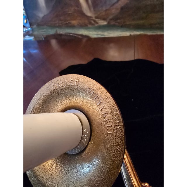 A superb pair of vintage e f caldwell style mid century wall sconces. Having a now naturally aged gilded gold patina with...