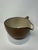 Designed by Edith Heath for Heath Ceramics, this vintage No. 110 Pouring Bowl is a wonderful example of California modern...