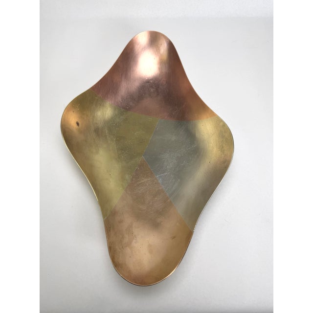 Vintage Mexican modernist free form footed tray by E. Cabello, Mexico, circa 1970s. It measures 12” x 7.5” x 2.5”h.