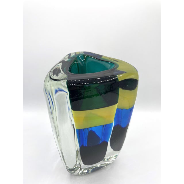 They are part of the series of vases and figures designed by Bianconi upon his return to Venini in the late 1980s. The...