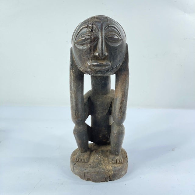 This compelling Luba sitting power figure, sometimes referred to as a Kasube, originates from the Democratic Republic of...
