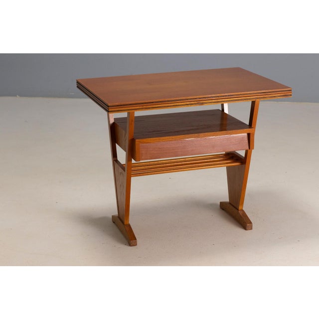 A practical and visually striking folding coffee table from the Czechoslovak design period, combining compact proportions...