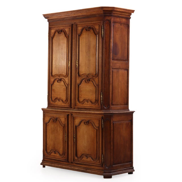 This French Provincial "Buffet à Deux Corps" (two-piece cabinet) is a beautiful example of regional French craftsmanship,...