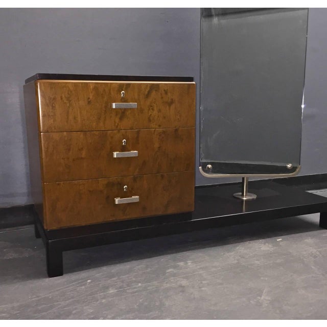 Dressing table with mirror designed by Axel Einar Hjorth for Nordiska Kompaniet, Sweden, circa 1930s. Two-tone stained...