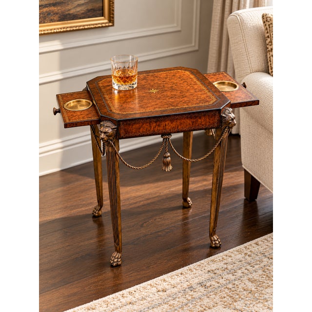 An exceptional neoclassical-style drink table attributed to Theodore Alexander, showcasing elaborate craftsmanship,...