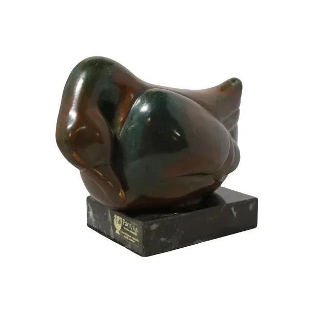 Bronze sculpture of duck 'Paor' on marble foot, from Spain. A plate is attached to the back with the signature of the...