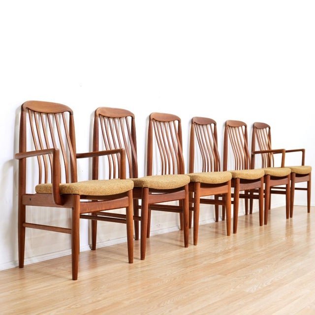 This stunning set of six dining chairs were designed by Benny Linden during the 1970s. Produced in teak with green freshly...