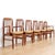 This stunning set of six dining chairs were designed by Benny Linden during the 1970s. Produced in teak with green freshly...