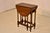 Circa 1900 period Edwardian oak gate leg table from England. The top is nicely grained and has a beveled edge. When the...