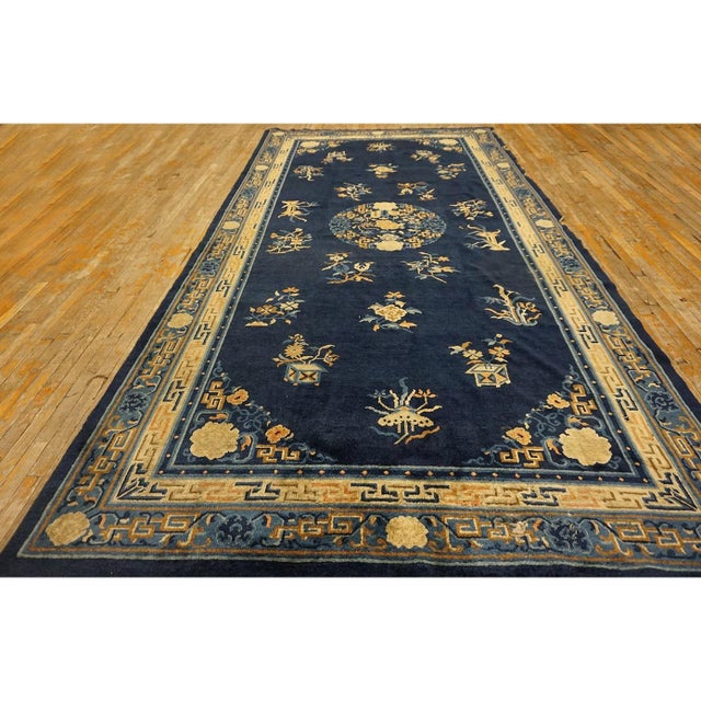 Blue Chinese Antique 1880s Rectangle Room Size Wool Knotted - Peking Rug, Circa Date: 1880s. This exceptional example of...