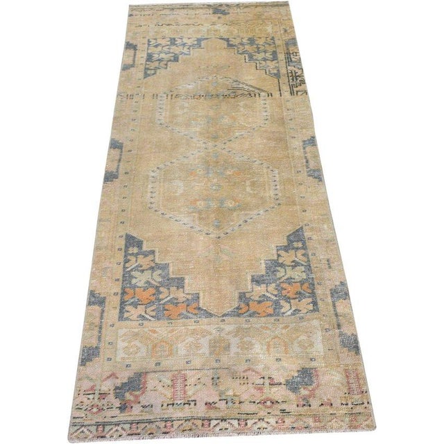 Hand-knotted with care using traditional rug-making techniques, this wool rug blends timeless craftsmanship with a modern...