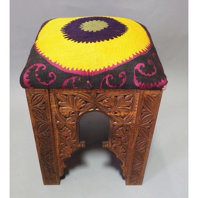 This stool is made of original handmade Suzani and solid wood. It is a Suzani stool upholstered with of an Old Suzani. It...