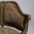 An elegant pair of Louis XV style armchairs featuring graceful curves and refined carved details. The upholstered seats...