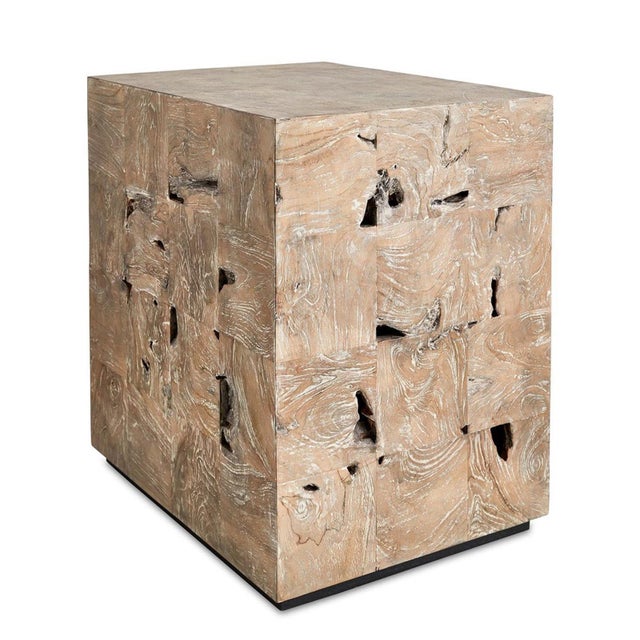 Crafted from squares of natural wire-brushed teak, this distinctive side table showcases the organic beauty of richly...