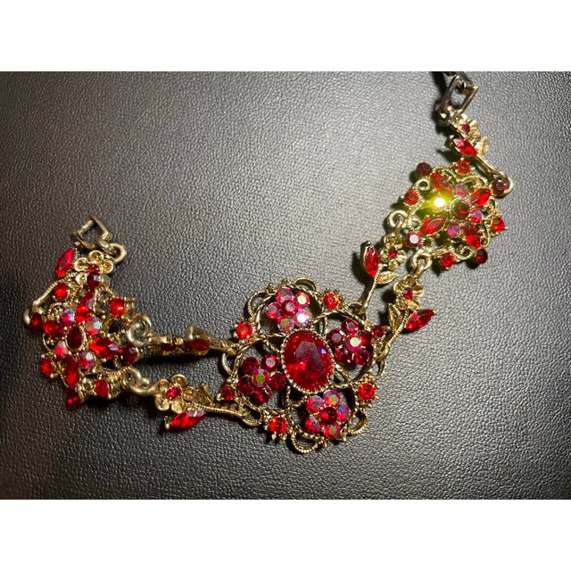 Gold MCM Jewelry by Bohemian (Czech) Artisans. Panel Link Bracelet Large Faceted Oval Ruby Glass Stone, Surrounded by Quatrefoil-Arranged Floral Clusters. For Sale - Image 8 of 8