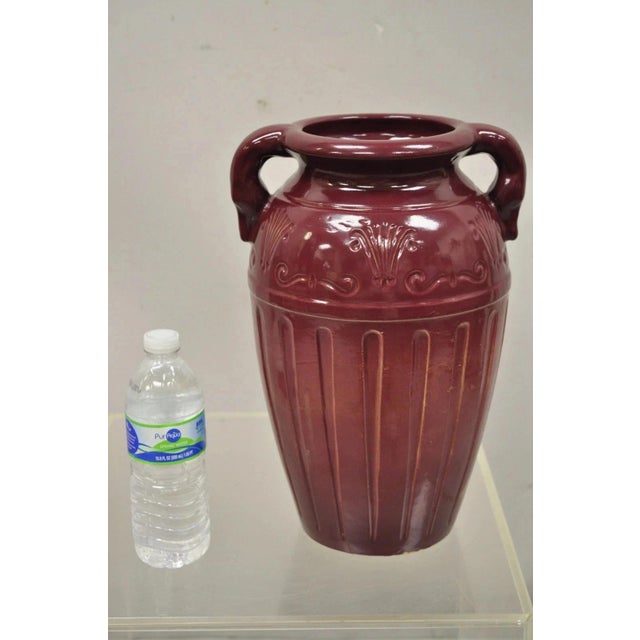 Antique R.R.P. Co Roseville, OH Red Stoneware Twin Handle 14" Red Jug Vase Vessel. Item features fan and scroll...