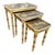 Charming vintage faux bamboo nesting tables featuring hand-decorated tops with playful monkey and tropical motifs. Crafted...