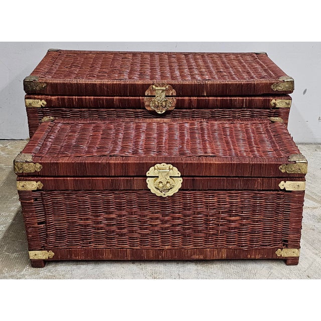 A Pair Late 20th Century Handcrafted Asian Wicker and Brass fitting Graduated Chests. Measures 31" in width, 16" in depth...