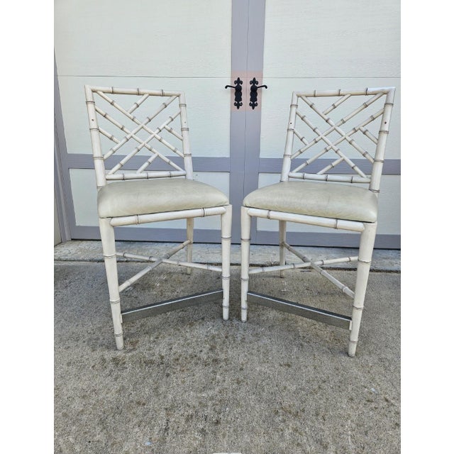 With its lattice back, bamboo styling, and beautiful rubbed finish, this counter stool is a not to classic Chinese...