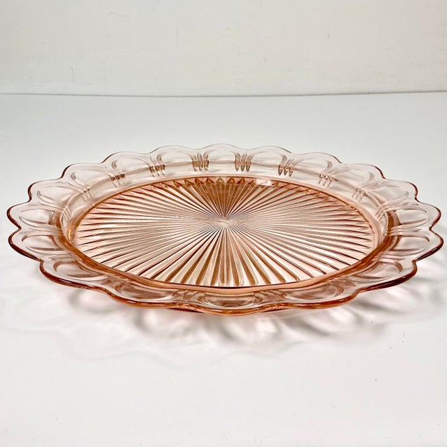 Vintage Home is pleased to present this Art Deco Depression Era Pink Glass Starburst Round Platter. This is a beautiful...
