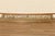Bring timeless European elegance to your fireplace with this impressive 19th-century French bronze fireplace fender,...