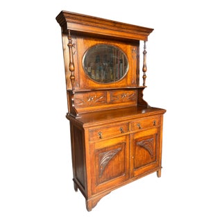 1800's Hand Carved Oak Hutch With Beveled Oval Mirror For Sale