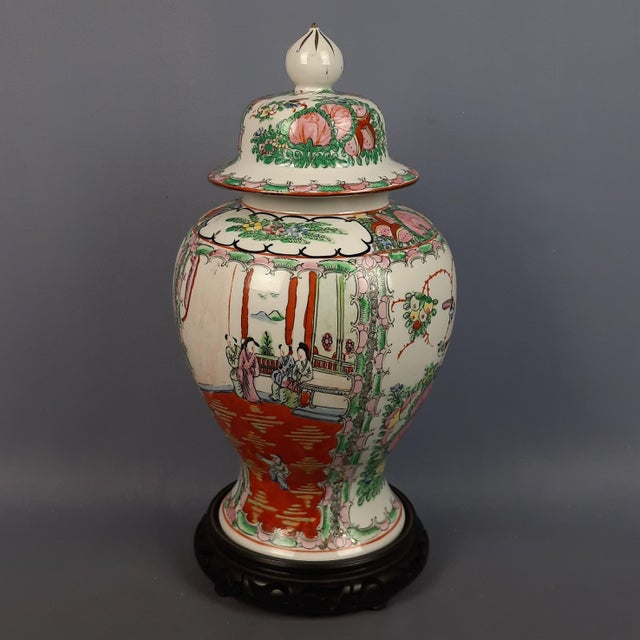 A stunning vintage potiche vase in decorative porcelain of oriental inspiration, original and marked on the base. Subject...