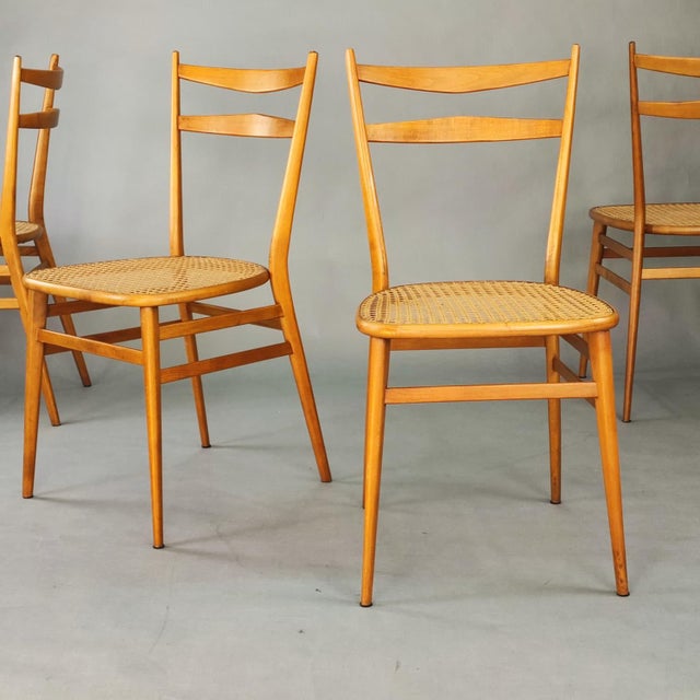 Set of 4 Chiavarina-style chairs, Italian design from the 1950s. Lightweight beech wood frame, with handmade Vienna straw...