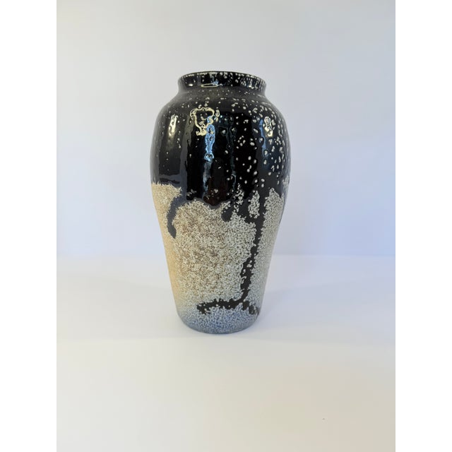 Funky, modern salt glazed vase signed by Georgia potter Noel Benedict. The wide mouth, at 2.25 inches in diameter, sits...
