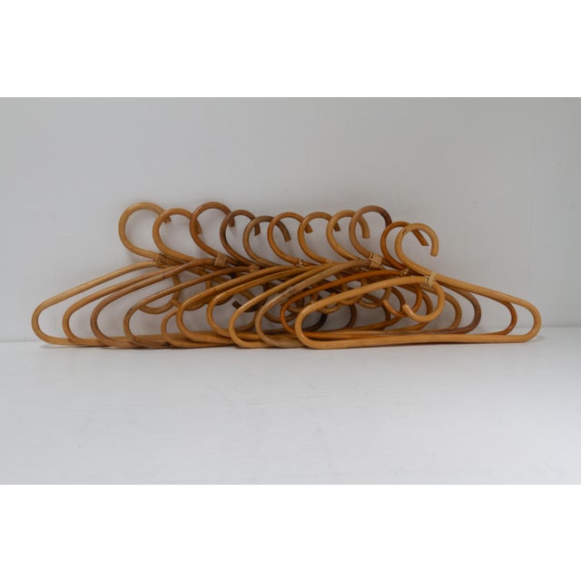 Vintage Italian Bamboo and Rattan Coat Hangers, 1960s. Set of 11. Genuine vintage Mid-Century Modern closet hangers in...